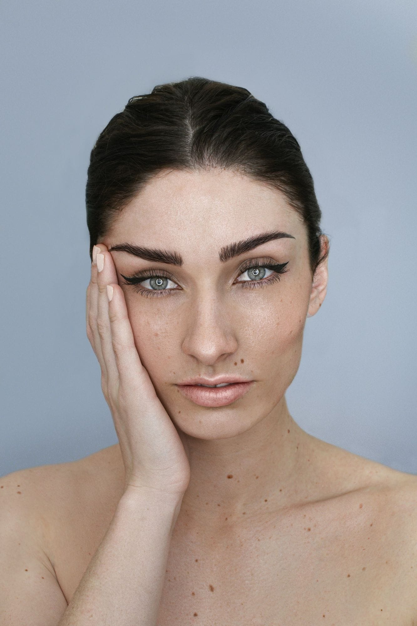 Portrait showing full, defined brows