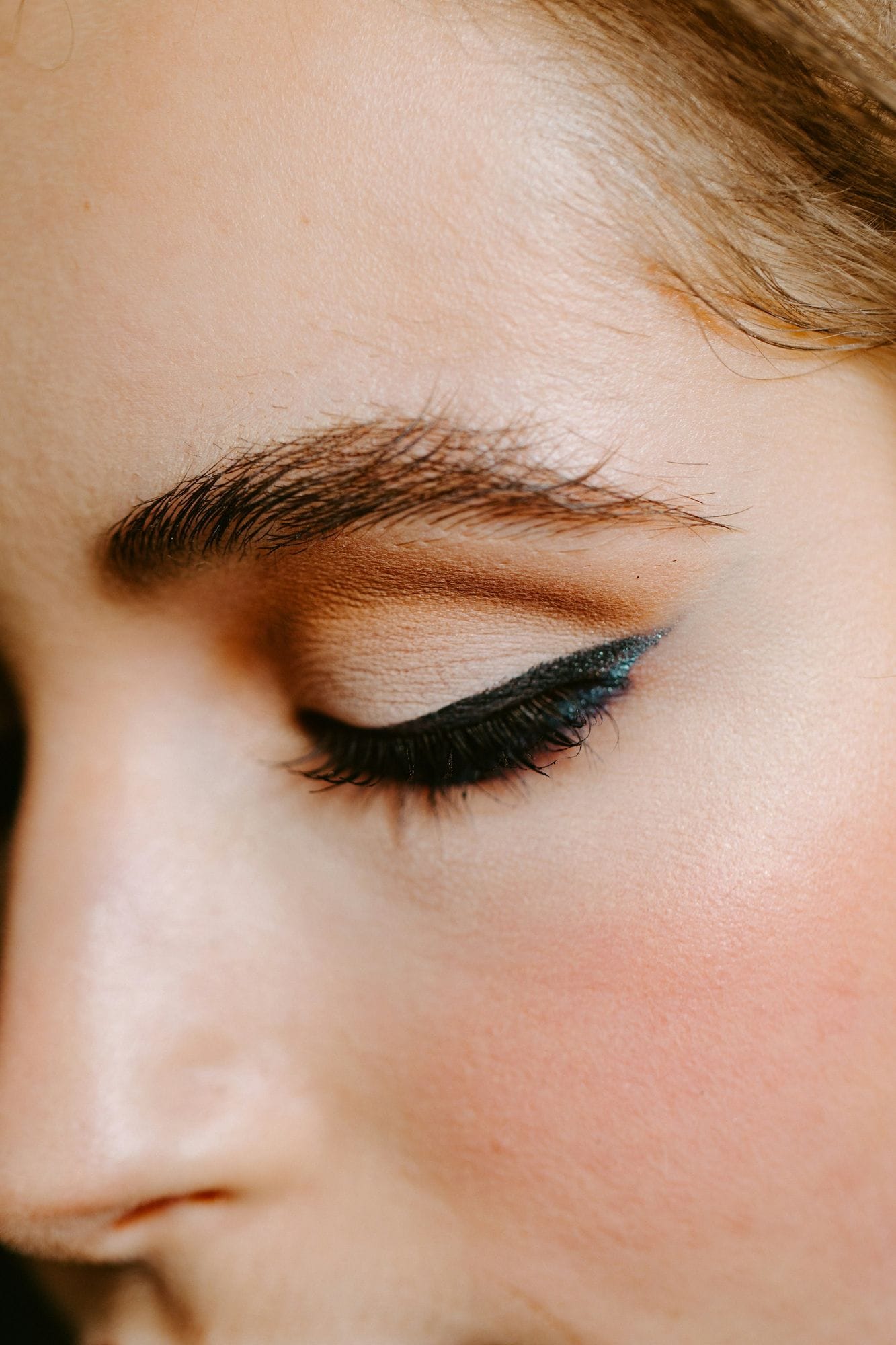Close-up of a shaped brow and defined eye